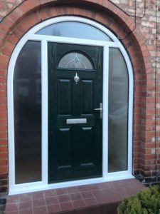 Front Composite Door and Arched Windows of House